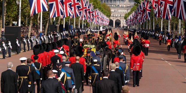 Senior members of the British Royal Family follow behind the coffin of Queen Elizabeth II during a procession from Buckingham Palace to Westminster Hall. 