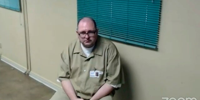 This screenshot from a Zoom video hearing shows Michael Carneal on Tuesday, Sept. 20, 2022 at Kentucky State Reformatory in La Grange, Ky.