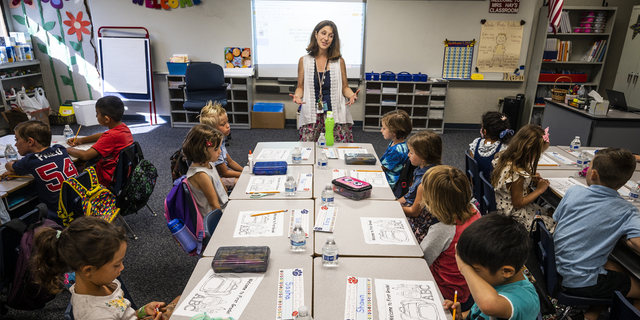 Teacher Christine Hay talks to her students at Melinda Heights Elementary School in Rancho Santa Margarita, California, on Aug. 15, 2022.