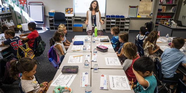 Teacher Christine Hay talks to her students at Melinda Heights Elementary School in Rancho Santa Margarita, California, on Aug. 15, 2022.