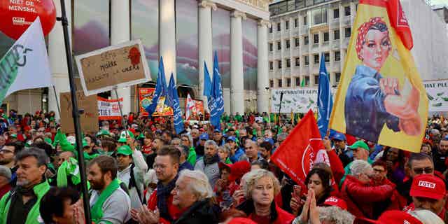 People are seen protesting skyrocketing energy costs in the middle of the Belgian capital, Brussels, on Sept. 21, 2022. 