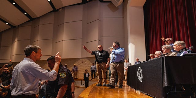 Democratic gubernatorial candidate Beto O'Rourke interrupts a press conference held by Texas Gov. Greg Abbott following a shooting at Robb Elementary School.