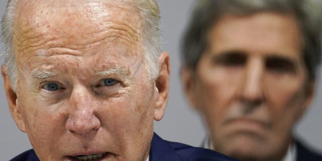 President Biden and Climate Envoy John Kerry are pictured during the 2021 United Nations climate summit in Scotland.