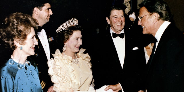 Queen Elizabeth II with President Ronald Reagan and the Rev. Billy Graham.