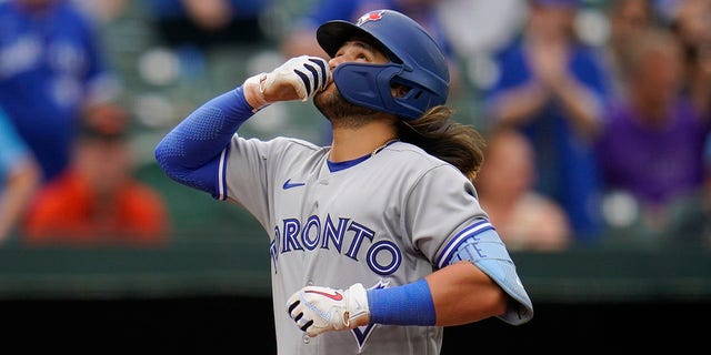 Beau Bichette of the Toronto Blue Jays after hitting a three-run homer off Baltimore Orioles relief pitcher Nick Vespi in the third inning of the second game of a baseball doubleheader in Baltimore on Monday, Sept. 5, 2022. , reacted. Blue Jays' Jackie Bradley Jr. and George Springer scored on home runs.