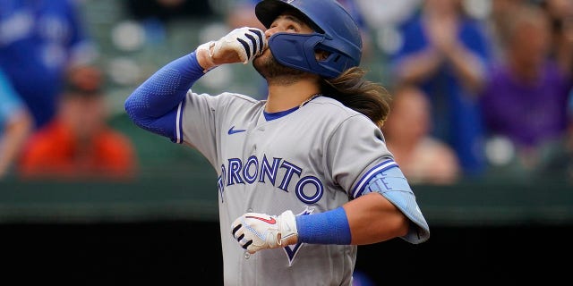 Beau Bichette of the Toronto Blue Jays after hitting a three-run homer off Baltimore Orioles relief pitcher Nick Vespi in the third inning of the second game of a baseball doubleheader in Baltimore on Monday, Sept. 5, 2022. , reacted. Blue Jays' Jackie Bradley Jr. and George Springer scored on home runs.