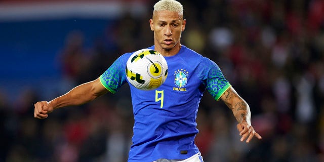 Richarlison of Brazil takes control of the ball during an international friendly match between Brazil and Tunisia at the Parc des Princes in Paris, France, 27 September 2022.