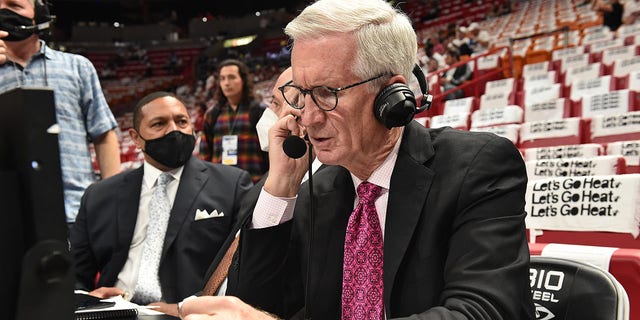 ESPN's Mike Breen speaks over his headset before a game between the Boston Celtics and the Miami Heat during Game 1 of the 2022 NBA Eastern Conference finals May 17, 2022, at FTX Arena in Miami, Fla.