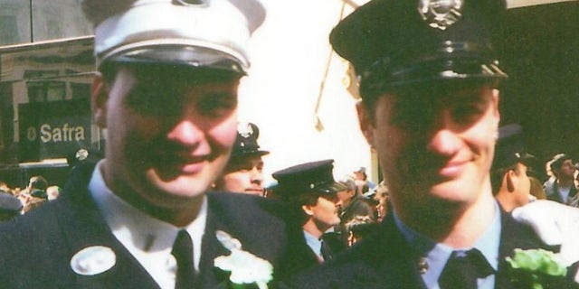 Tommy and Timmy Haskell dress in their uniforms to attend the St. Patrick's Day parade in New York City.