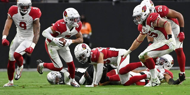 Arizona Cardinals cornerback Byron Murphy Jr. (7) lands a fumble and returns it for the game-winning touchdown in overtime against the Las Vegas Raiders in Las Vegas on September 18, 2022.