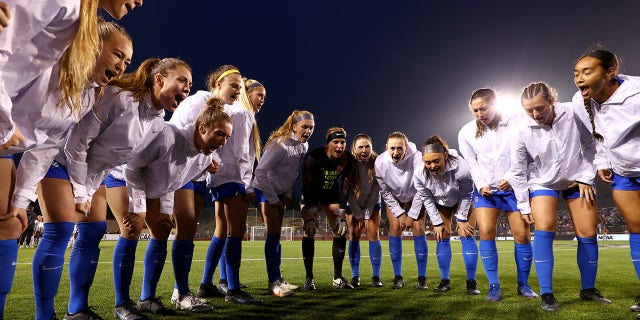 The BYU Cougars get pumped up to take on the Florida State Seminoles in the Division I women's soccer championship at Stevens Stadium in Santa Clara, Calif., on Dec. 6, 2021.