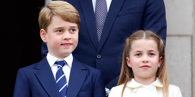 Prince George and Princess Charlotte (pictured in June) will walk behind the Queen's coffin at her funeral Monday, according to the Palace.