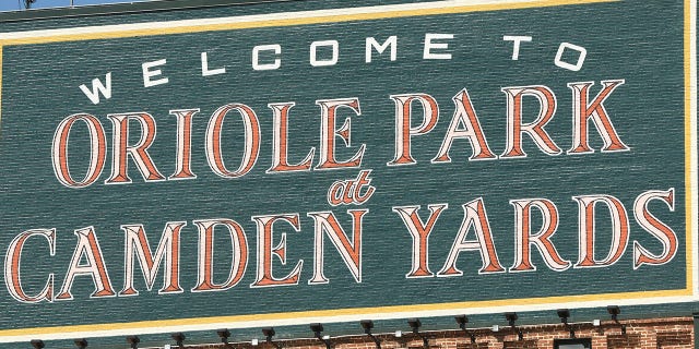 Signage on the warehouse outside Oriole Park at Camden Yards Aug. 7, 2022, in Baltimore. 