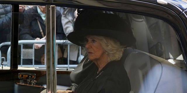 Camilla, the Queen Consort follows the procession of Queen Elizabeth II's coffin from the Palace of Holyroodhouse to St Giles' Cathedral, in Edinburgh, Monday, Sept. 12, 2022. 