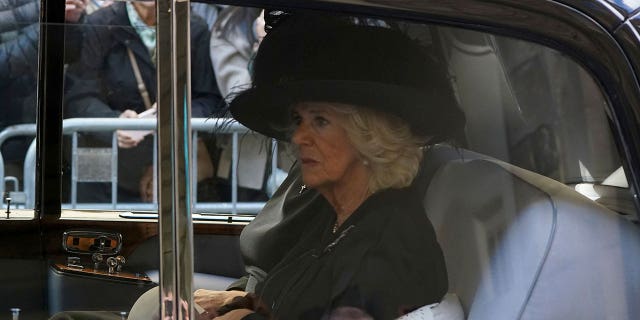 Camilla, the Queen Consort follows the procession of Queen Elizabeth II's coffin from the Palace of Holyroodhouse to St Giles' Cathedral, in Edinburgh, Monday, Sept. 12, 2022.