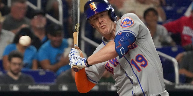 Mark Canha of the New York Mets gets out of the way of a pitch during the fourth inning against the Miami Marlins at loanDepot park Sept. 9, 2022, in Miami, Fla.