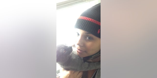Stefanie Whitley is seen holding her cat, Lilly. She shared these family photos with Fox News Digital.