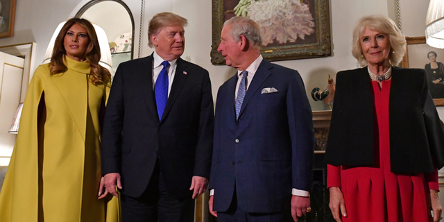 President Donald Trump and first lady Melania Trump meet with Prince Charles and Camilla, Duchess of Cornwall, ahead of the NATO alliance summit, at Clarence House, in London, Dec. 3, 2019. (Nicholas Kamm/Pool via Reuters)