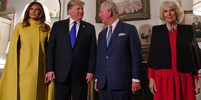 President Donald Trump and first lady Melania Trump meet with Prince Charles and Camilla, Duchess of Cornwall, ahead of the NATO alliance summit, at Clarence House, in London, Dec. 3, 2019. (Nicholas Kamm/Pool via Reuters)