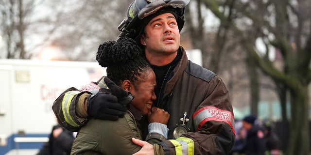 'Chicago Fire' Taylor Kinney wears firefighter gear while filming