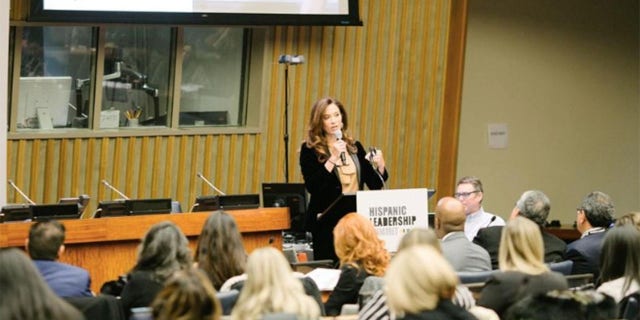 Claudia Romo Edelman speaks during a presentation. Roberto Clemente and Celia Cruz are two of the Hispanic Americans highlighted in a new biography book series for children available in both English and Spanish.