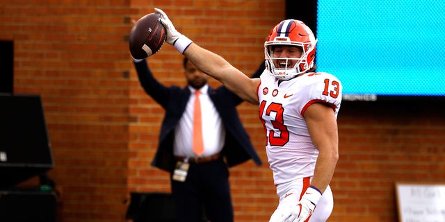 Brannon Spector #13 of the Clemson Tigers reacts following a touchdown during the first half of their game against the Wake Forest Demon Deacons at Truist Field on September 24, 2022, in Winston-Salem, North Carolina.