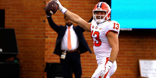 Brannon Spector #13 of the Clemson Tigers reacts following a touchdown during the first half of their game against the Wake Forest Demon Deacons at Truist Field on September 24, 2022, in Winston-Salem, North Carolina.