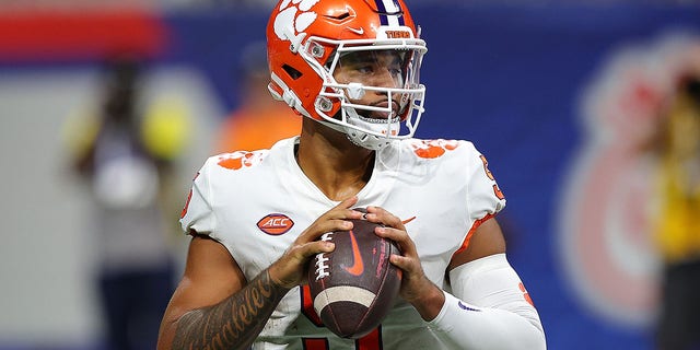 DJ Uiagalelei #5 of the Clemson Tigers looks to pass against the Georgia Tech Yellow Jackets during the second quarter at Mercedes-Benz Stadium on September 05, 2022, in Atlanta, Georgia.