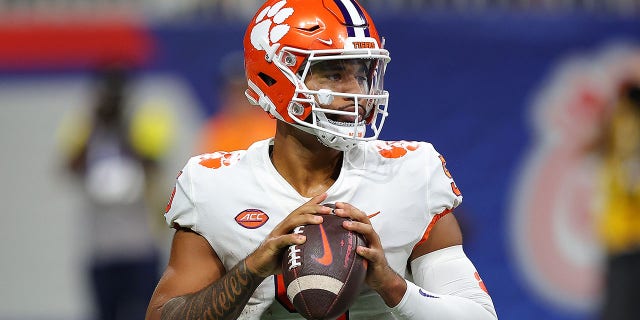 DJ Uiagalelei #5 of the Clemson Tigers looks to pass against the Georgia Tech Yellow Jackets during the second quarter at Mercedes-Benz Stadium on September 05, 2022, in Atlanta, Georgia.