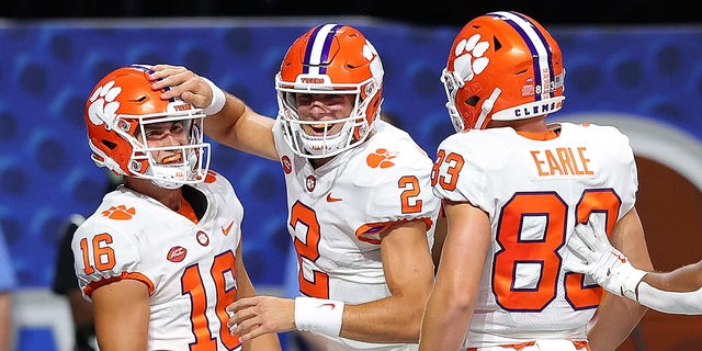 Cade Klubnik #2 of the Clemson Tigers celebrates a touchdown pass to Will Taylor #16 against the Georgia Tech Yellow Jackets in the fourth quarter on Sept. 5, 2022 at Mercedes-Benz Stadium in Atlanta, GA. 