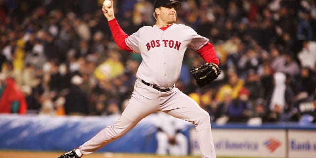 Pitcher Curt Schilling of the Boston Red Sox throws a pitch against the New York Yankees in the first inning of Game 6 of the American League Championship Series Oct. 19, 2004, at Yankee Stadium in the Bronx borough of New York City.