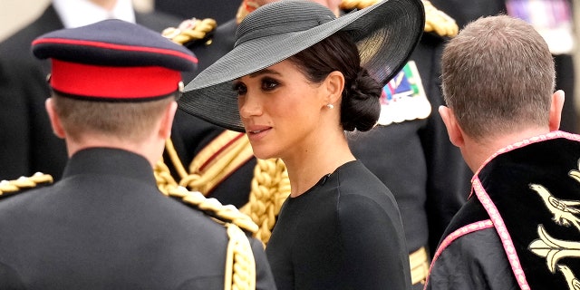 Meghan, Duchess of Sussex, arrives at Westminster Abbey for the state funeral of Queen Elizabeth II.