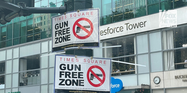Signs read "Gun Free Zone" in New York City's Manhattan borough. 