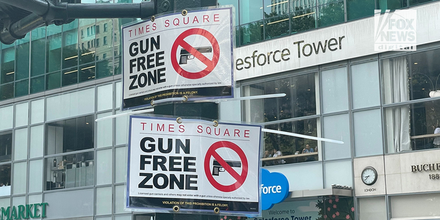 Signs read "Gun Free Zone" in New York City's Manhattan borough. 