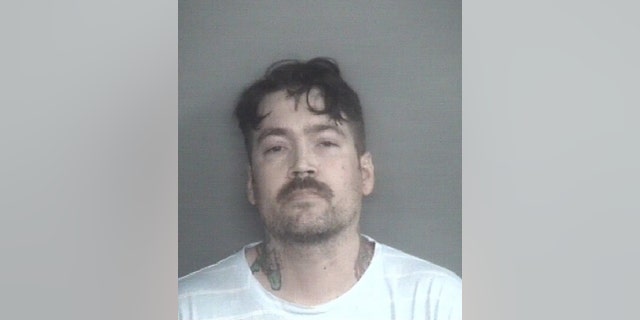 Dallas Marsh, 37, is accused of plotting a "Las Vegas-style" mass shooting and threatening cops.