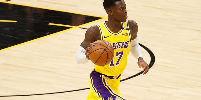 Dennis Schroder of the Los Angeles Lakers handles the ball during the first half of Game 2 of a Western Conference first-round playoff series at Phoenix Suns Arena May 25, 2021, in Phoenix, Ariz.