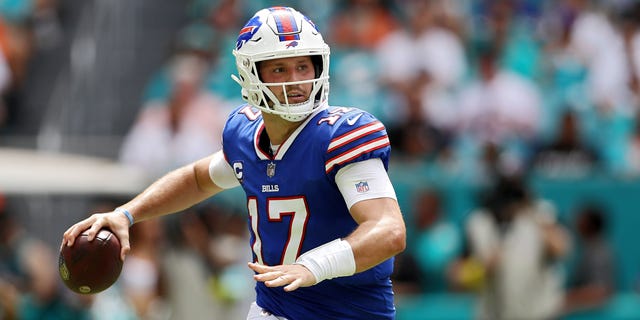 Quarterback Josh Allen of the Buffalo Bills looks to pass against the Miami Dolphins at Hard Rock Stadium in Miami Gardens, Florida, on Sept. 25, 2022.