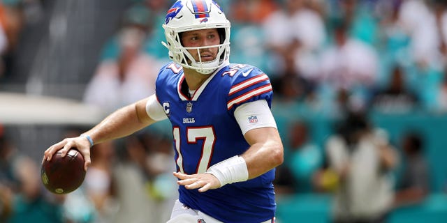 Quarterback Josh Allen of the Buffalo Bills passes the ball during the first half against the Miami Dolphins at Hard Rock Stadium in Miami Gardens, Florida, on Sept. 25, 2022.