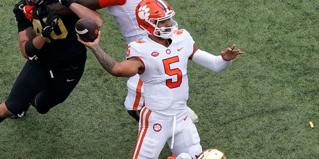 Clemson quarterback DJ Uiagalelei (5) looks to pass against Wake Forest during the first half of an NCAA college football game in Winston-Salem, N.C., Saturday, Sept. 24, 2022.
