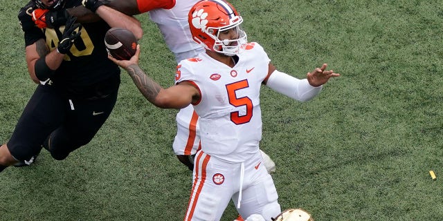 Clemson quarterback DJ Uiagalelei (5) looks to pass against Wake Forest during the first half of an NCAA college football game in Winston-Salem, N.C., Saturday, Sept. 24, 2022.