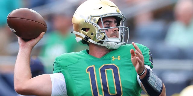 Drew Pyne of the Notre Dame Fighting Irish warms up prior to the game against the California Golden Bears at Notre Dame Stadium in South Bend, Indiana, on Sept. 17, 2022.