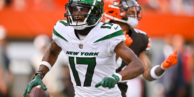 New York Jets wide receiver Garrett Wilson celebrates after scoring a touchdown, Sunday, Sept. 18, 2022, in Cleveland.