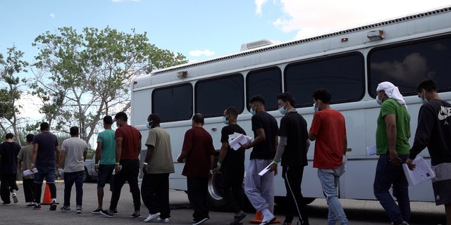 A Customs and Border Protection bus drops off dozens of migrants, mostly from Venezuela, at the City of El Paso's migrant welcome center Sept. 22, 2022.