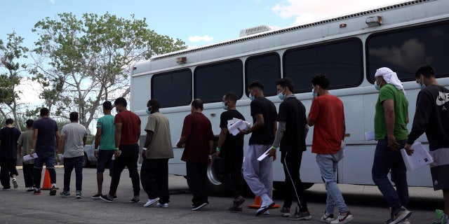 A Customs and Border Protection bus unloads dozens of migrants, mostly from Venezuela, at the Migrant Welcome Center in the city of El Paso on Sept. 22, 2022.