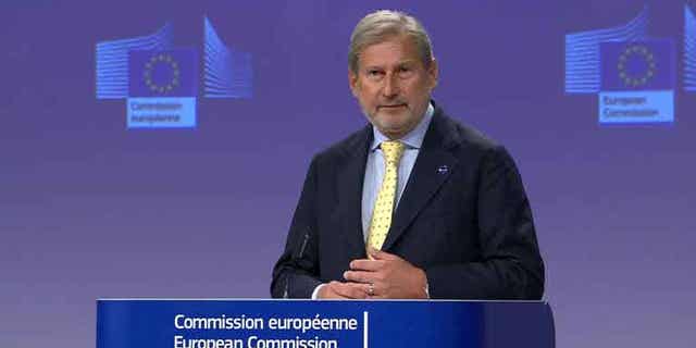EU Budget Commissioner Johannes Hahn announces plans for the EU to withhold funds from Hungary until the country is able to demonstrate that corruption is under control, in a speech in Brussels, Belgium, on September 18 of 2022.