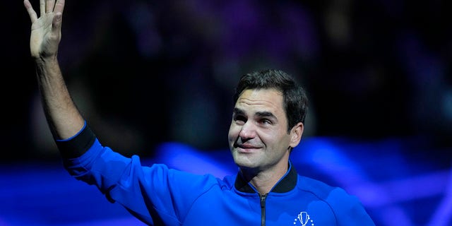 Roger Federer waves to the crowd after playing with Rafael Nadal in their Laver Cup doubles match at the O2 Arena in London, Friday, Sept. 23, 2022. Federer's doubles match with Nadal marked the end of his glittering career.