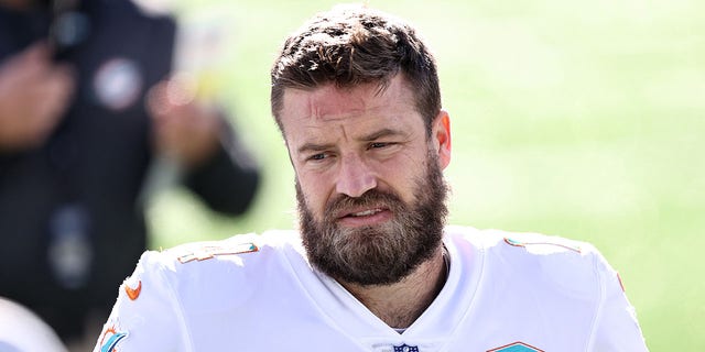 Ryan Fitzpatrick of the Miami Dolphins warms up before a game against the New York Jets at Metlife Stadium.  September 29, 2020 East Rutherford, New Jersey