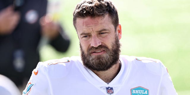 Ryan Fitzpatrick of the Miami Dolphins warms up prior to a game against the New York Jets at MetLife Stadium Nov. 29, 2020, in East Rutherford, N.J.