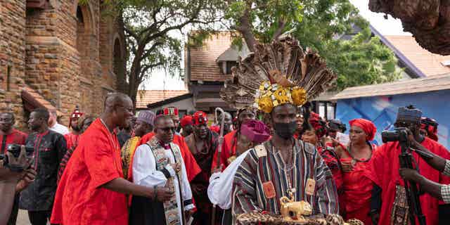 Ghana has declared an end to its Marburg virus outbreak which claimed the lives of two people in the country. Pictured: Members of the Ga Traditional Council honor Queen Elizabeth II in Accra, Ghana, on Sept. 16, after her passing.