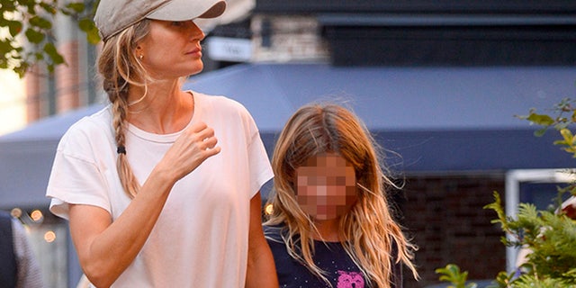 Gisele Bündchen is spotted for the first time since reports that she and Tom Brady are living in separate houses amid split rumors. The Brazilian supermodel surfaced looking downcast in New York City where she was seen on a shopping trip with her daughter, Vivian.